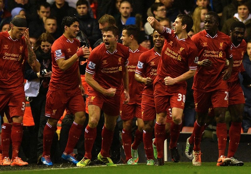 derby demolition goals from skipper steven gerrard and striker luis suarez around a daniel sturridge brace secured victory over a subdued everton to strengthen liverpool s hold on fourth place photo afp