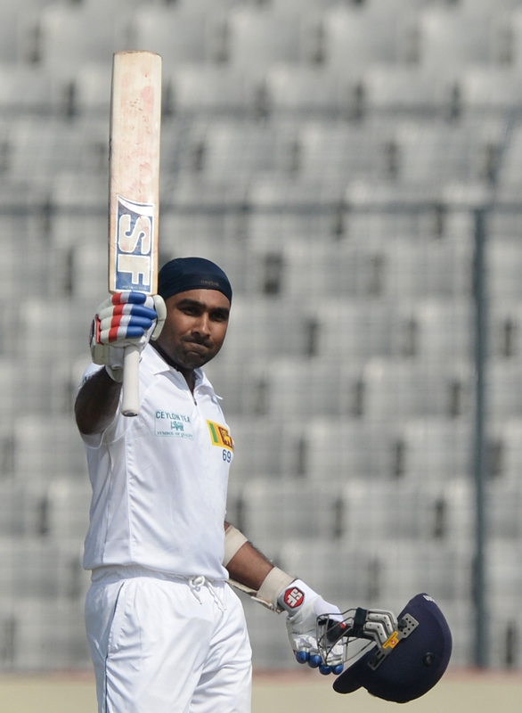 impressive mahela jayawardene made 203 not out smashing 16 boundaries and four sixes to complete his seventh double century in 33 three figure knocks photo afp