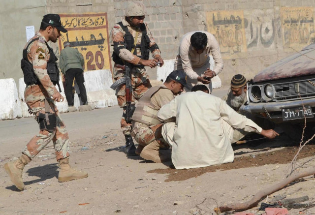 rangers officials collecting evidences the blast under the nazimabad no 7 flyover in karachi photo express rashid ajmeri rangers officials collecting evidences the blast under the nazimabad no 7 flyover in karachi photo express rashid ajmeri