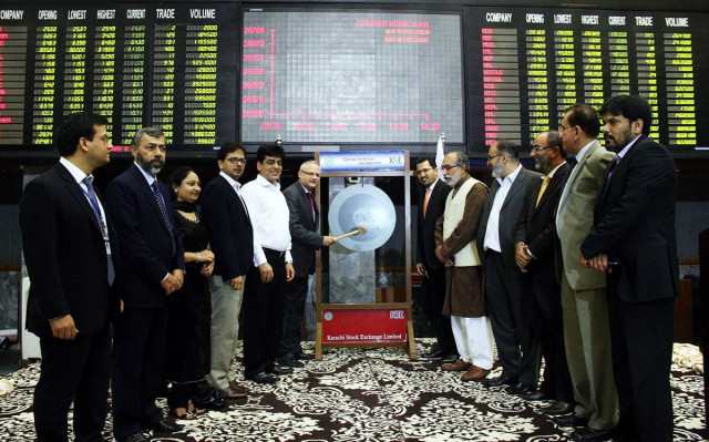 managing director of karachi stock exchange nadeem naqvi rings the traditional bell to mark the launch photo online managing director of karachi stock exchange nadeem naqvi rings the traditional bell to mark the launch photo online