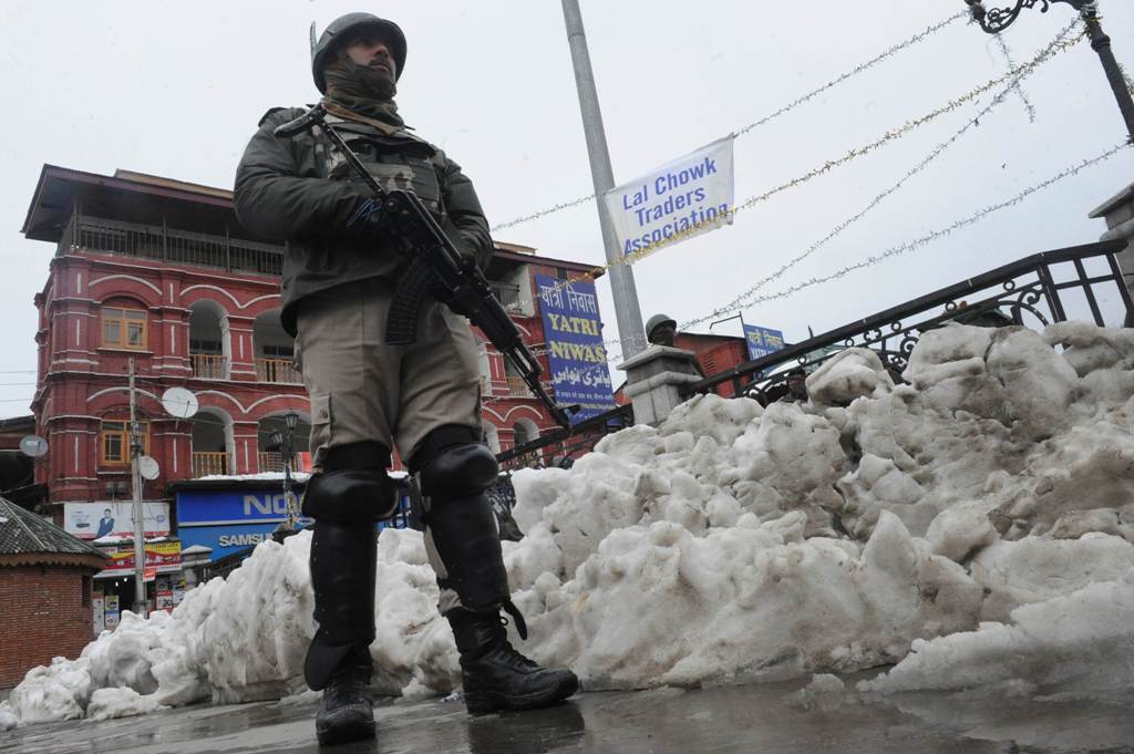 an indian paramilitary trooper patrols in srinagar photo afp