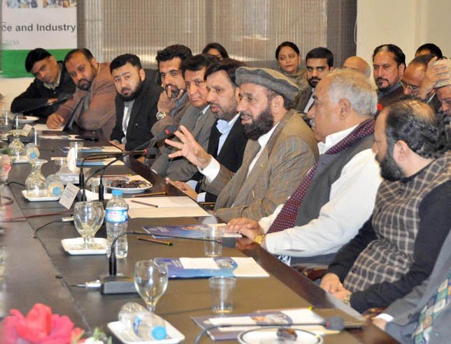 sardar mohammad yousaf chairing a meeting of the hajj and umrah committee at the rawalpindi chamber of commerce and industry on february 1 2104 photo pid