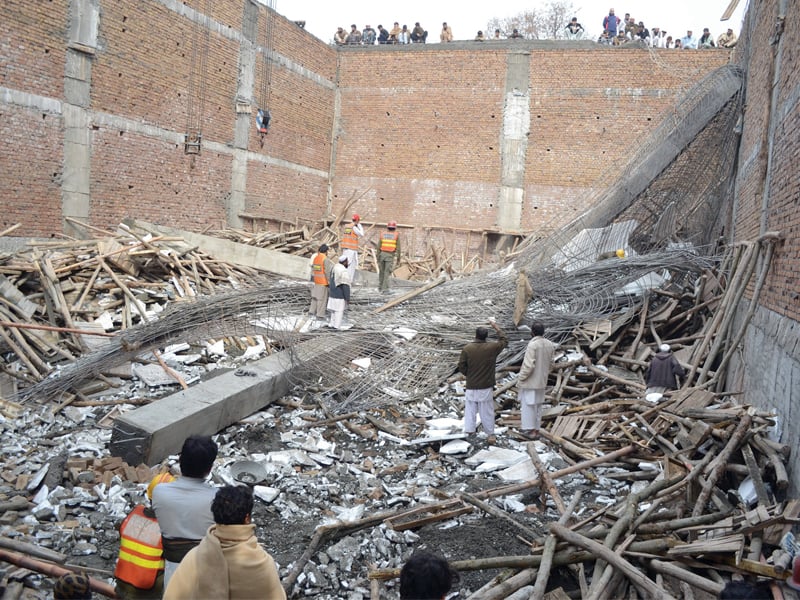 at least 14 workers were trapped under the debris after the structure suddenly collapsed photo muhammad iqbal express