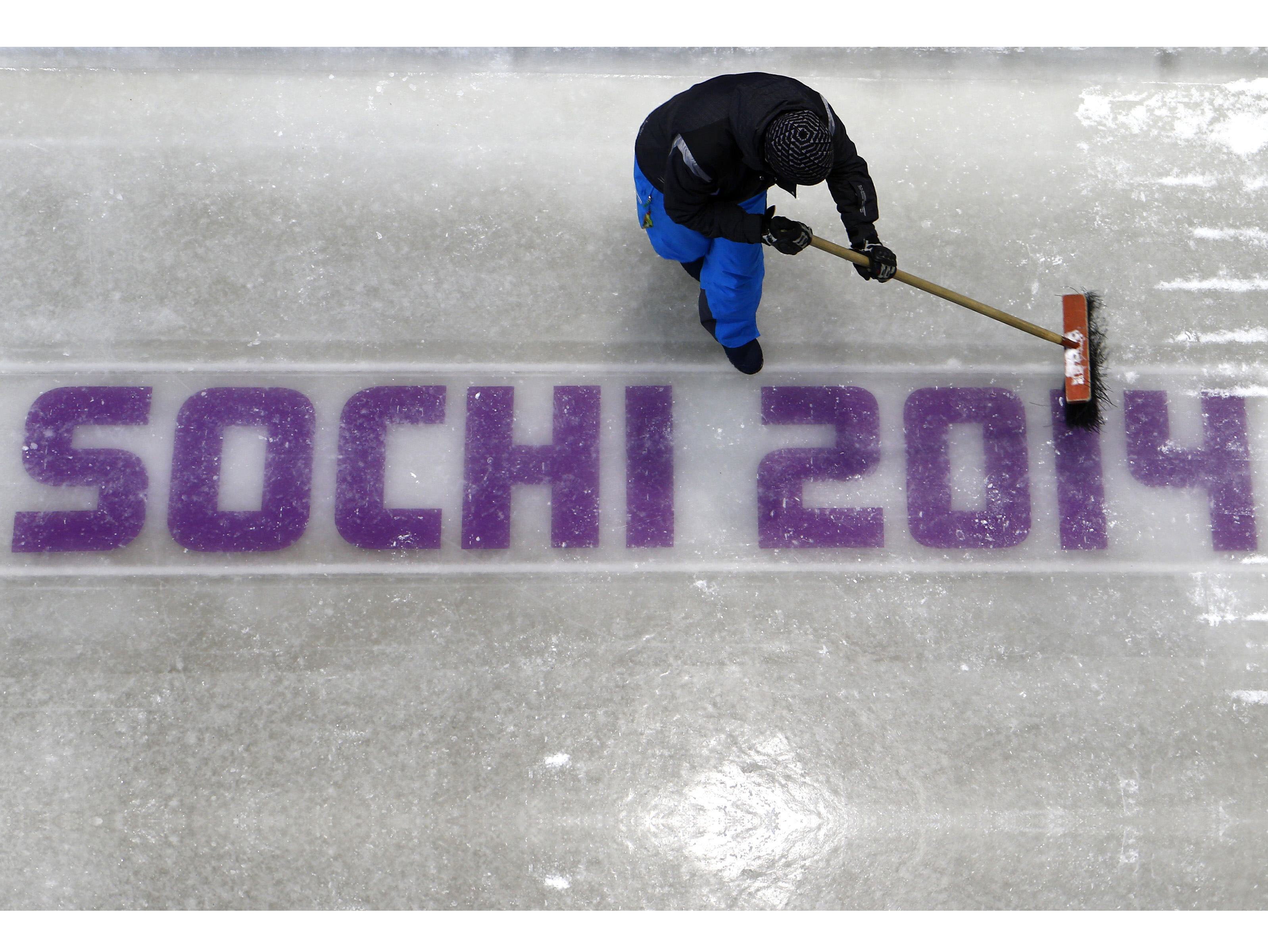 a workers cleans the track at the start of the bobsleigh ice track at the sanki sliding center in rosa khutor a venue for the sochi 2014 winter olympics near sochi february 2 2014 photo reuters