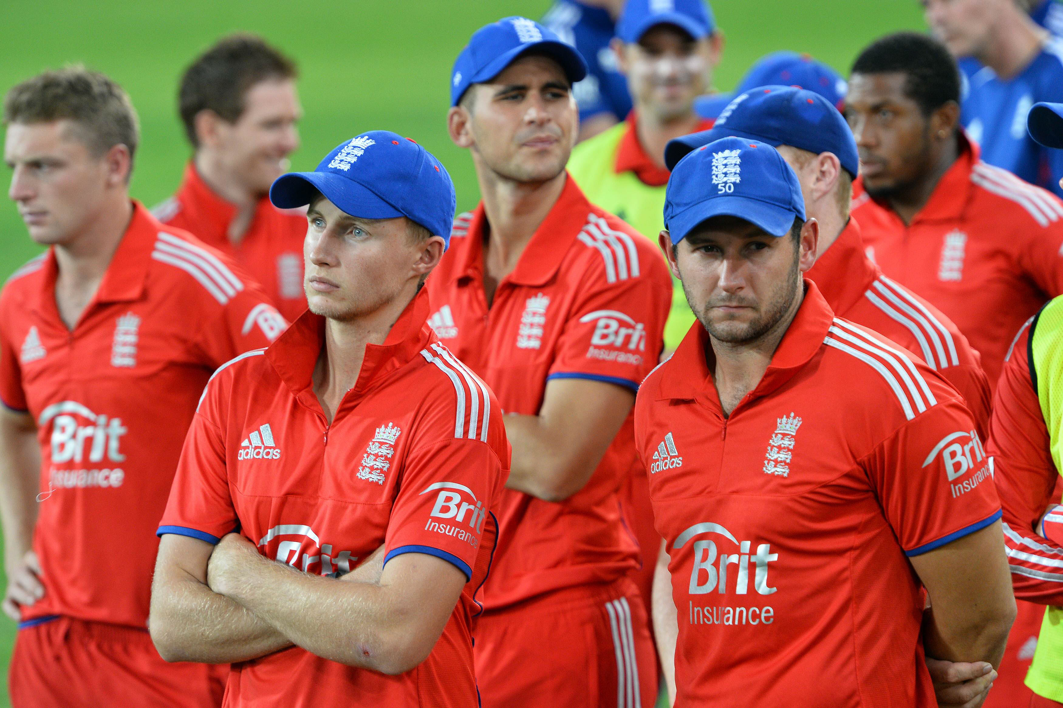 england players wear a dejected look after defeat in the final t20 photo afp