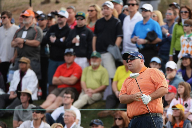 kevin stadler plays a shot on the 18th hole during the final round of the waste management phoenix open at tpc scottsdale on february 2 2014 in scottsdale arizona photo afp kevin stadler plays a shot on the 18th hole during the final round of the waste management phoenix open at tpc scottsdale on february 2 2014 in scottsdale arizona photo afp