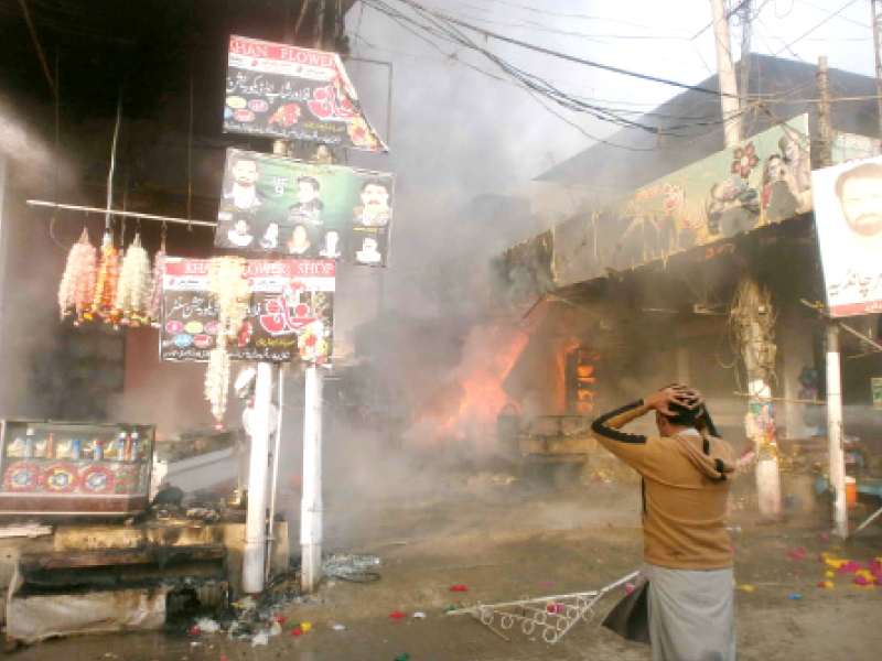 the fire started at a shop that sold garlands made from currency notes photo tariq ismaeel express