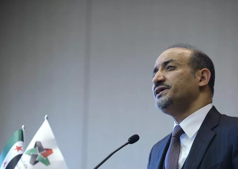 syrian national coalition snc leader ahmad jarba speaks during a press briefing on the peace talks on january 31 2014 in geneva photo afp syrian national coalition snc leader ahmad jarba speaks during a press briefing on the peace talks on january 31 2014 in geneva photo afp