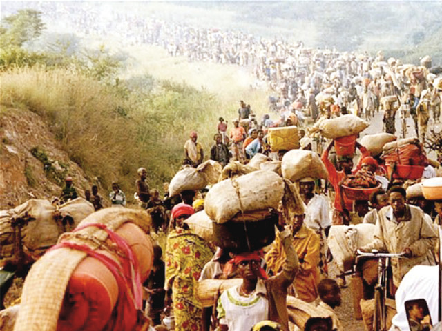 refugees cross the rusumo border into tanzania from rwanda in may 1994 photo reuters refugees cross the rusumo border into tanzania from rwanda in may 1994 photo reuters