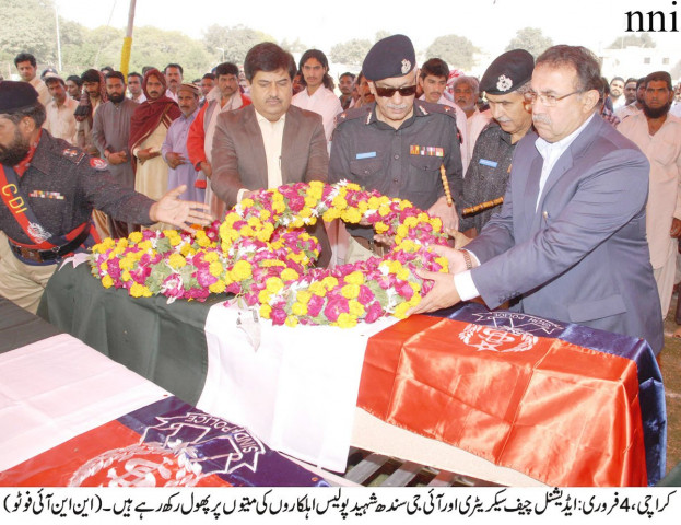 additional chief secretary karachi and ig sindh lay wreaths atop coffins of policemen gunned down in karachi photo nni additional chief secretary karachi and ig sindh lay wreaths atop coffins of policemen gunned down in karachi photo nni