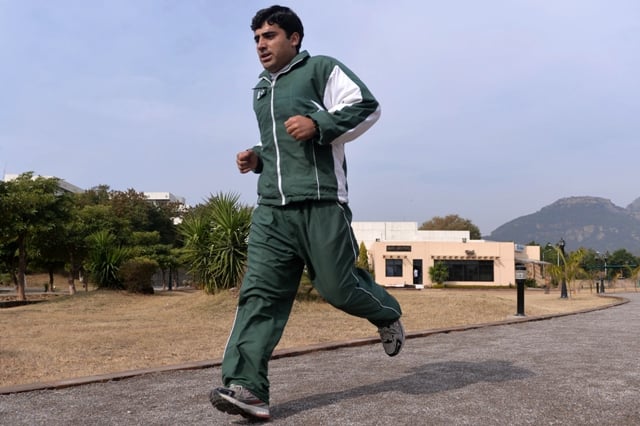 pakistani skier mohammad karim runs during a training session in islamabad photo afp