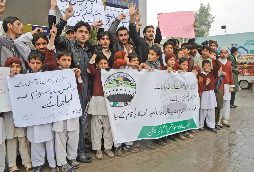 students from the tribal areas protest outside the peshawar press club for the reconstruction of their schools photo muihammad iqbal express students from the tribal areas protest outside the peshawar press club for the reconstruction of their schools photo muihammad iqbal express