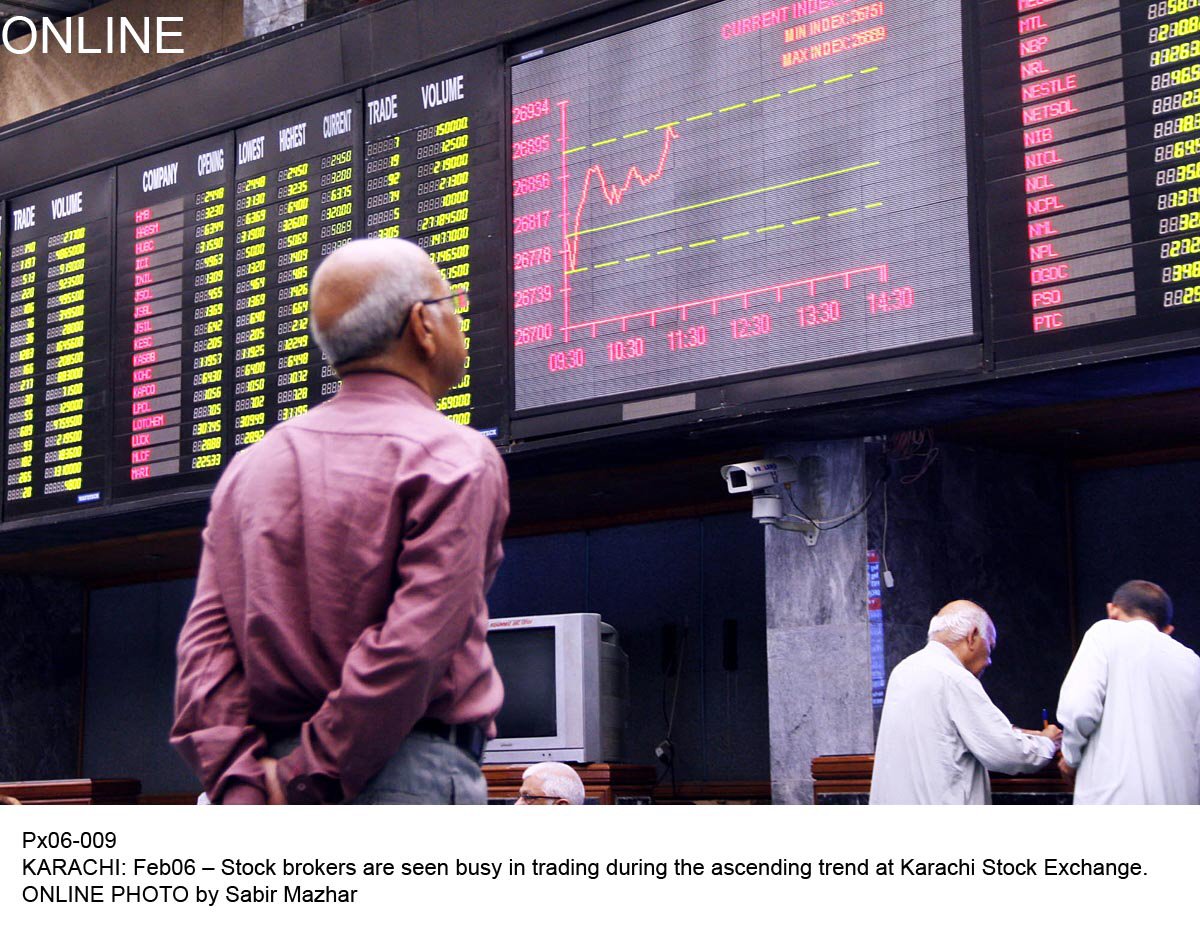 a stock broker looks at the trading at karachi stock exchange on thursday photo online