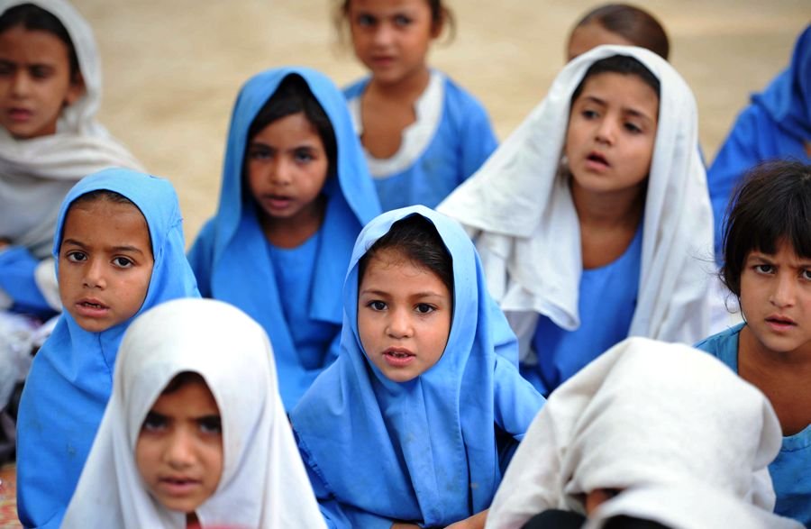 girls attend class at a school in mingora a town in swat valley on october 9 2013 photo afp