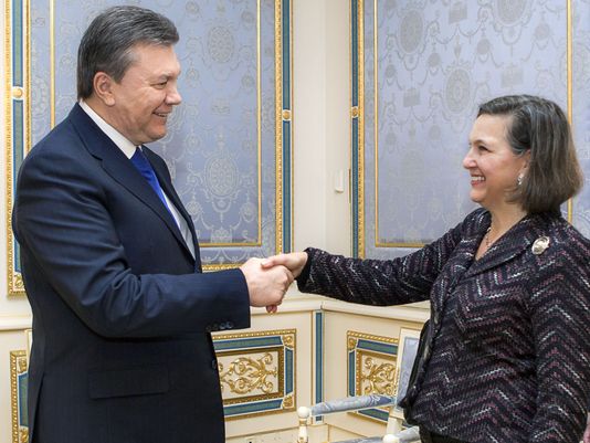 us state department assistant secretary of state for european and eurasian affairs victoria nuland shakes hands with ukrainian president viktor yanukovych in kiev on feb 6 2014 photo afp