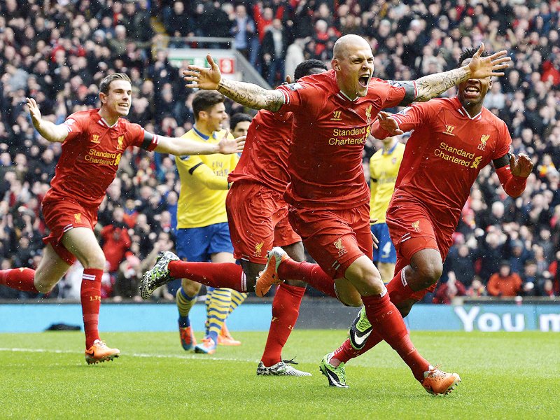 liverpool struck four times in the first 20 minutes as arsenal saw their unbeaten run of 10 games in all competitions torn to shreds in brutal fashion photo reuters