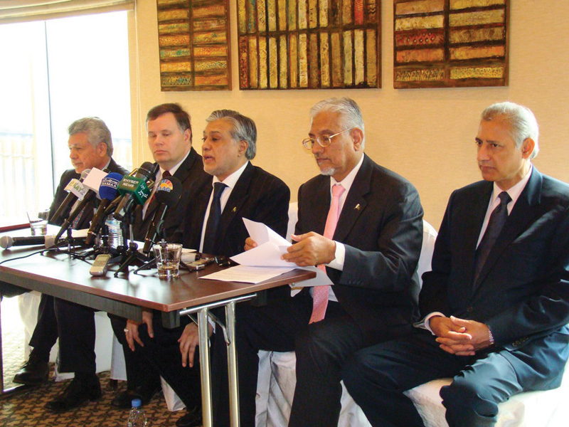 finance minister ishaq dar addresses the media along with imf officials in dubai photo pid