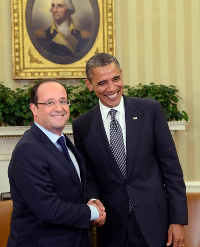 us president barack obama r shaking hands with his french counterpart francois hollande in the oval office at the white house in washington photo afp