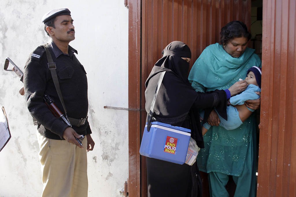 a file photo showing polio worker administering drops photo express shafiq malik