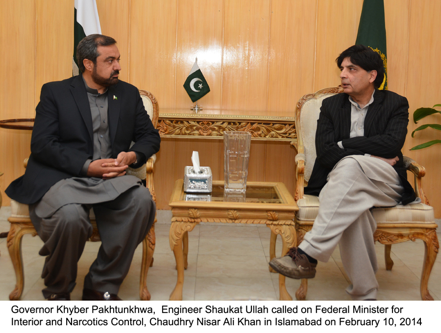 interior minister chaudhry nisar ali khan in a meeting with governor k p shaukatullah in islamabad on february 10 2014 photo pid