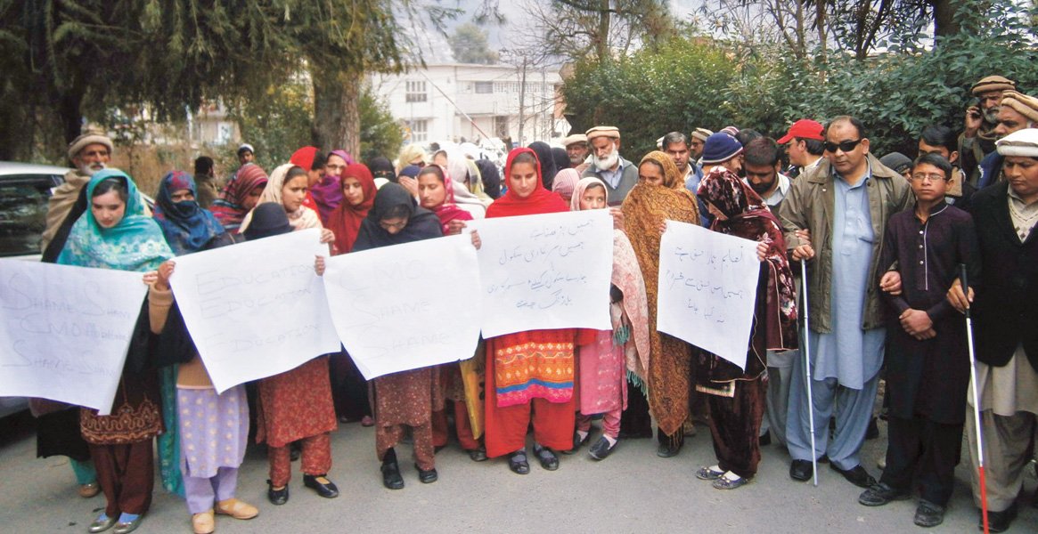 primary school girls and their teachers protest against local authorities for ignoring their plight photo express