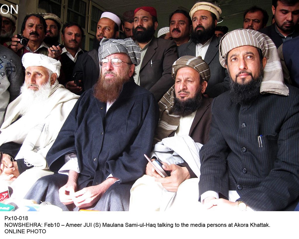 jui s chief maulana samiul haq talking to the media persons at akora khattak photo online