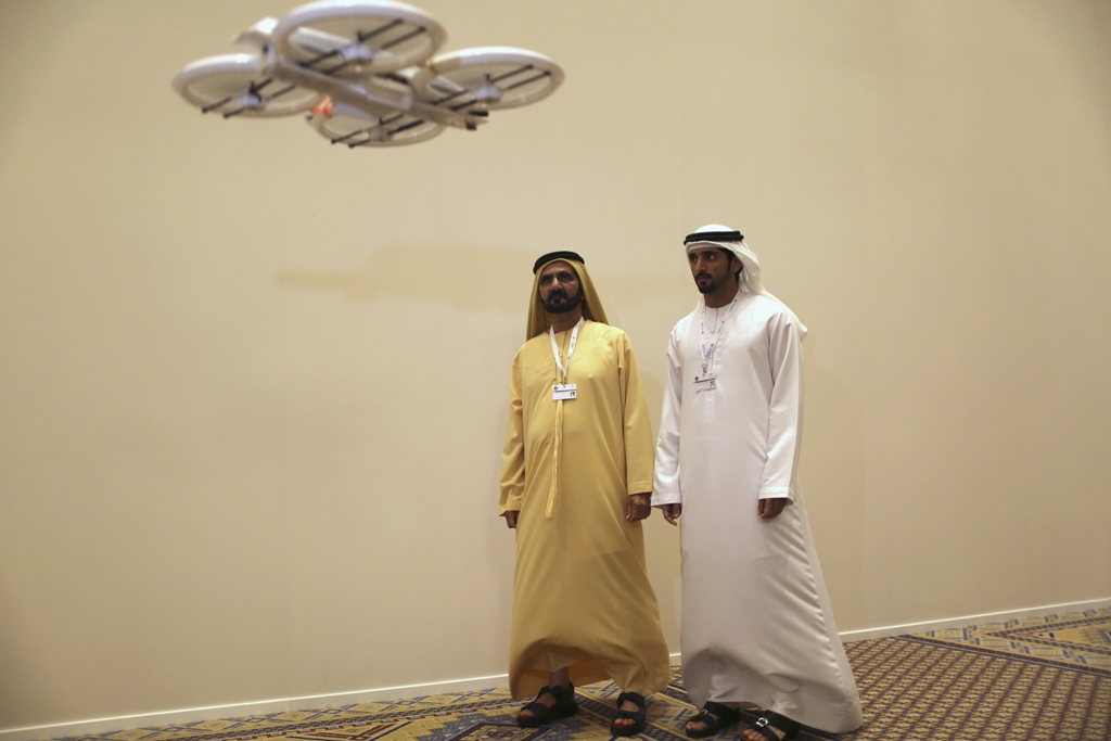 united arab emirates 039 prime minister and ruler of dubai sheikh mohammed bin rashid al maktoum l and his son dubai 039 s crown prince sheikh hamdan bin mohammed al maktoum watch an unmanned aerial drone photo reuters