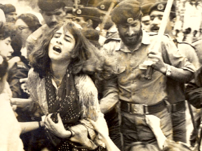 the picture shows zhila shah being baton charged by the police photo rahat dar shirkatgah