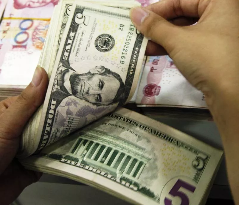 us envoy assures swift transfer of outstanding dues photo afp