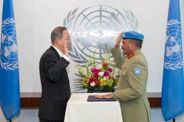ahmed taking the oath in front of ban ki moon photo unmultimedia org