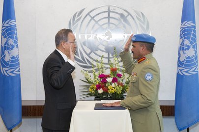 ahmed taking the oath in front of ban ki moon photo unmultimedia org