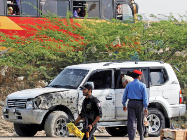 the suicide blast damaged the front and the left window of brigadier basit s car photo athar khan express the suicide blast damaged the front and the left window of brigadier basit s car photo athar khan express