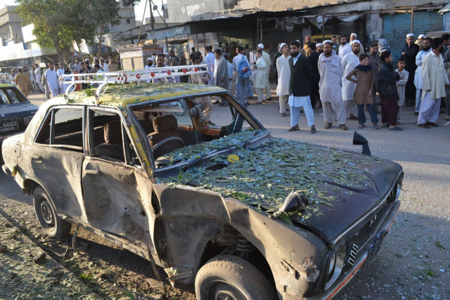 the taxi that was damaged in one of the blasts on saturday morning photo mohammad azeem express the taxi that was damaged in one of the blasts on saturday morning photo mohammad azeem express