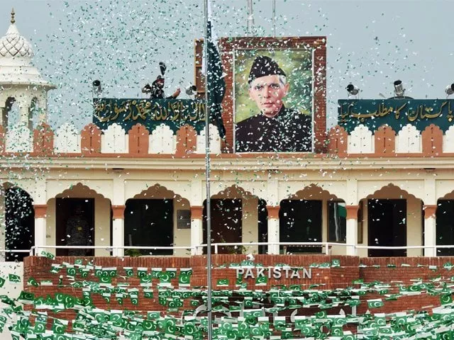 the portrait of muhammad ali jinnah is displayed at the india pakistan border in wagah as a pakistani ranger unfurls the flag during a ceremony to celebrate pakistan s independence photo afp the portrait of muhammad ali jinnah is displayed at the india pakistan border in wagah as a pakistani ranger unfurls the flag during a ceremony to celebrate pakistan s independence photo afp
