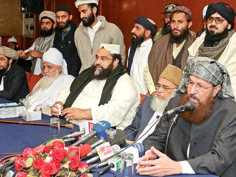 maulana samiul haq briefs the media after ulema and mashaikh convention photo afp