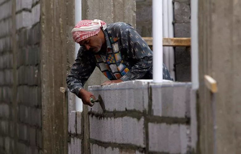 a labourer works at a construction site in riyadh photo reuters a labourer works at a construction site in riyadh photo reuters