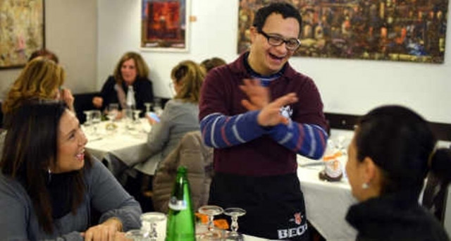 a waiter at the girasoli restaurant in rome chats to customers photo afp a waiter at the girasoli restaurant in rome chats to customers photo afp