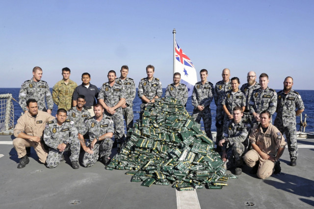 a handout photo released on february 18 2014 by the australian government department of defence shows hmas melbourne 039 s boarding party gathering around nearly two tonnes of hashish piled up on the ship 039 s flight deck following a successful narcotics inderdiction operation in the middle east area of operations photo afp a handout photo released on february 18 2014 by the australian government department of defence shows hmas melbourne 039 s boarding party gathering around nearly two tonnes of hashish piled up on the ship 039 s flight deck following a successful narcotics inderdiction operation in the middle east area of operations photo afp