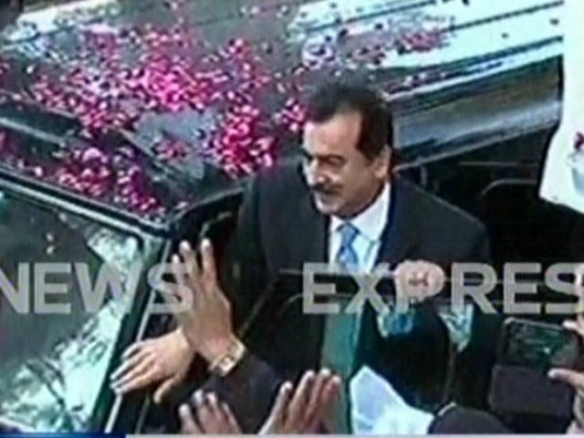 an express news screengrab showing gilani near the court an express news screengrab showing gilani near the court
