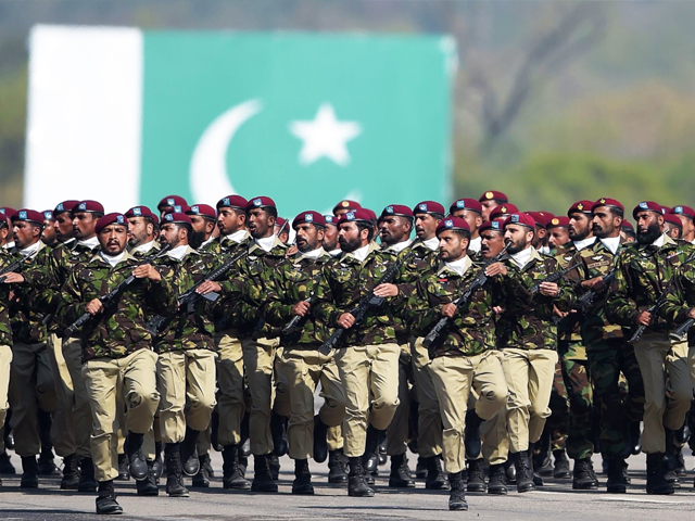 ssg personnel march during the pakistan day parade in islamabad photo afp