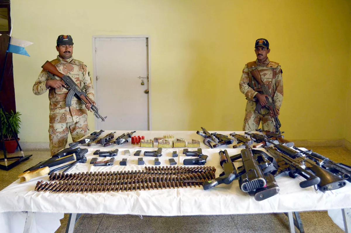 rangers personnel display the latest haul of weapons they claim to have recovered during security operations in karachi photo mohammad azeem express rangers personnel display the latest haul of weapons they claim to have recovered during security operations in karachi photo mohammad azeem express