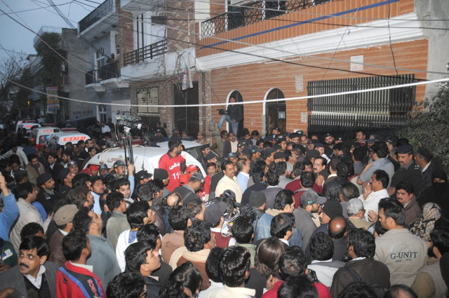 people gathered outside the house where eight members of a family were bludgeoned to death photo express tariq hasan people gathered outside the house where eight members of a family were bludgeoned to death photo express tariq hasan