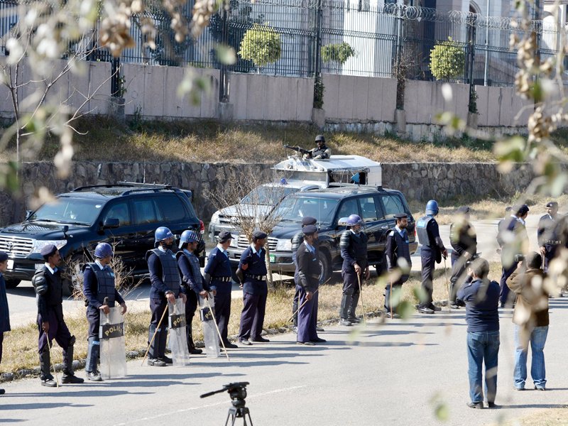 a car transports former president musharraf to the special court photo reuters