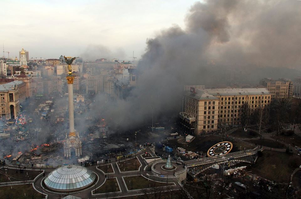 some protesters on the smoke filled square hurled molotov cocktails and cobblestones at the lines of riot police while others piled wood on to the burning barricades separating them from the security forces photo reuters