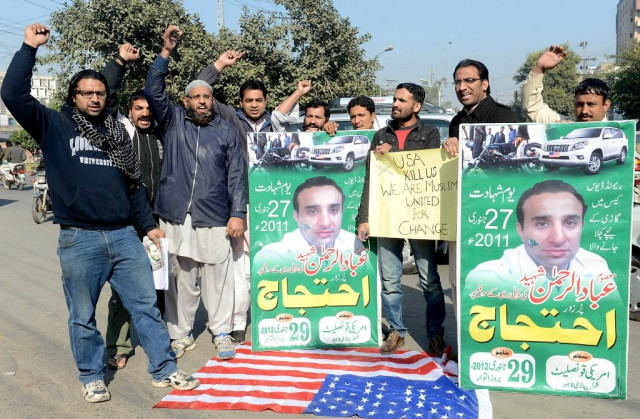 people chant slogans against cia agent raymond davis photo riaz ahmed people chant slogans against cia agent raymond davis photo riaz ahmed