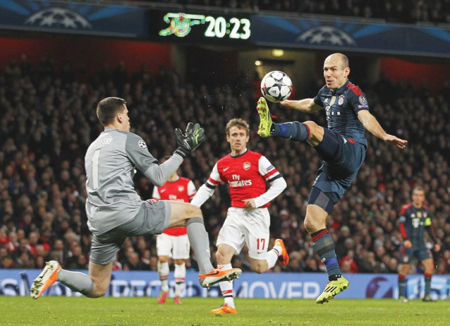 arsenal were defeated by german giants bayern munich 2 0 in their champions league clash on wednesday in a match filled with controversies and missed penalties photo afp arsenal were defeated by german giants bayern munich 2 0 in their champions league clash on wednesday in a match filled with controversies and missed penalties photo afp