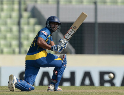 kumara sangakkara scored a fine 128 off 115 balls against bangladesh in the second one day international played in dhaka on fenruary 20 2014 photo afp