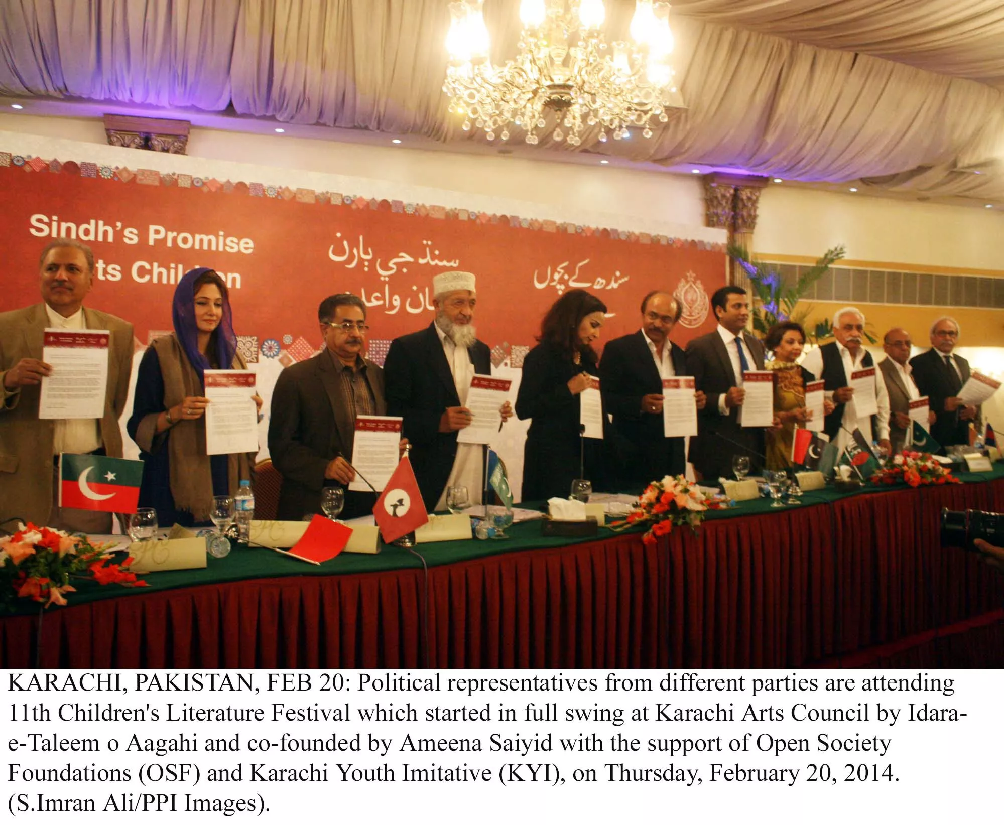 representatives of the major political parties in sindh at the children 039 s literature festival hold up the copy of the pledge to education photo ppi representatives of the major political parties in sindh at the children 039 s literature festival hold up the copy of the pledge to education photo ppi