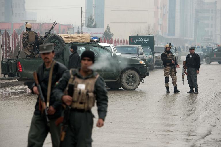 afghan police secure the area where the attack took place photo afp