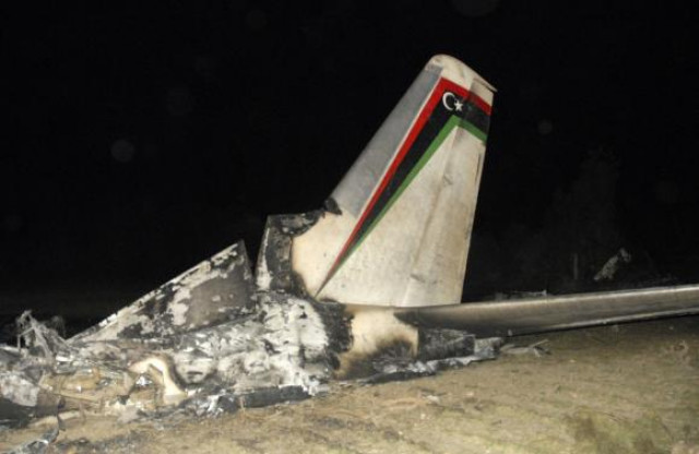 the wreckage of a libyan military plane is seen in grombalia town south of tunis february 21 2014 photo reuters the wreckage of a libyan military plane is seen in grombalia town south of tunis february 21 2014 photo reuters